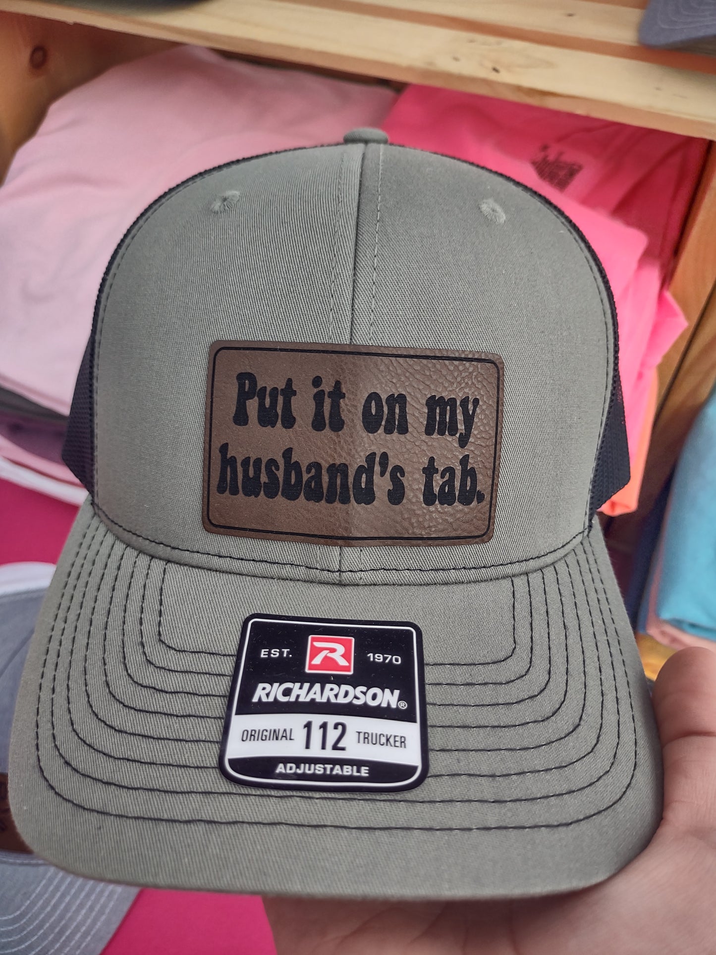 Put it on my husband's tab hat