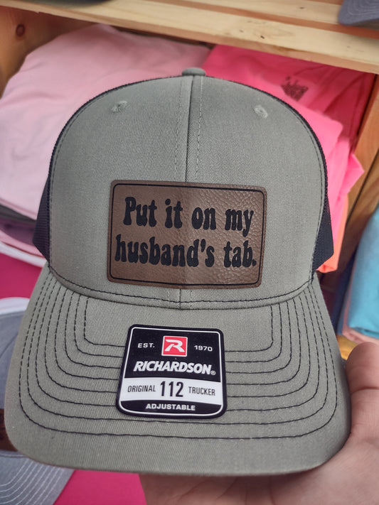 Put it on my husband's tab hat